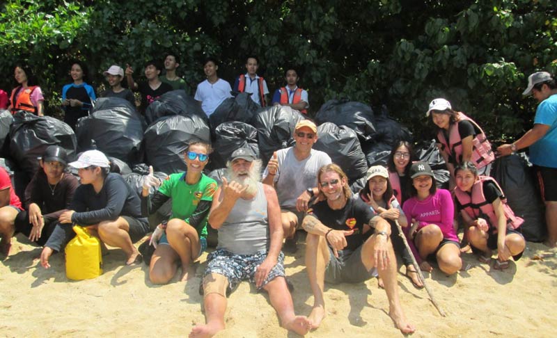 John Gray Sea Canoe beach clean up with Super Divers